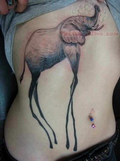Belly Piercing And Dali Elephant Tattoo On Hip